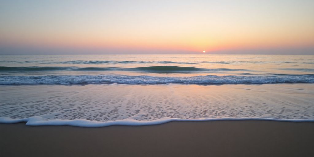 Tranquil beach at sunset, evoking peace and reflection.